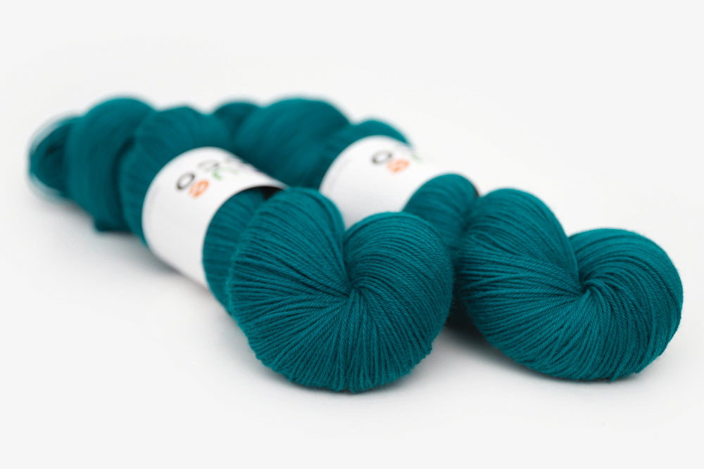 semisolid hand dyed blue green teal phyllis sock yarn