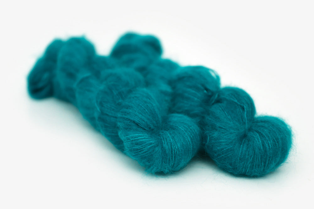 semisolid hand dyed blue green teal alpaca suri lace yarn