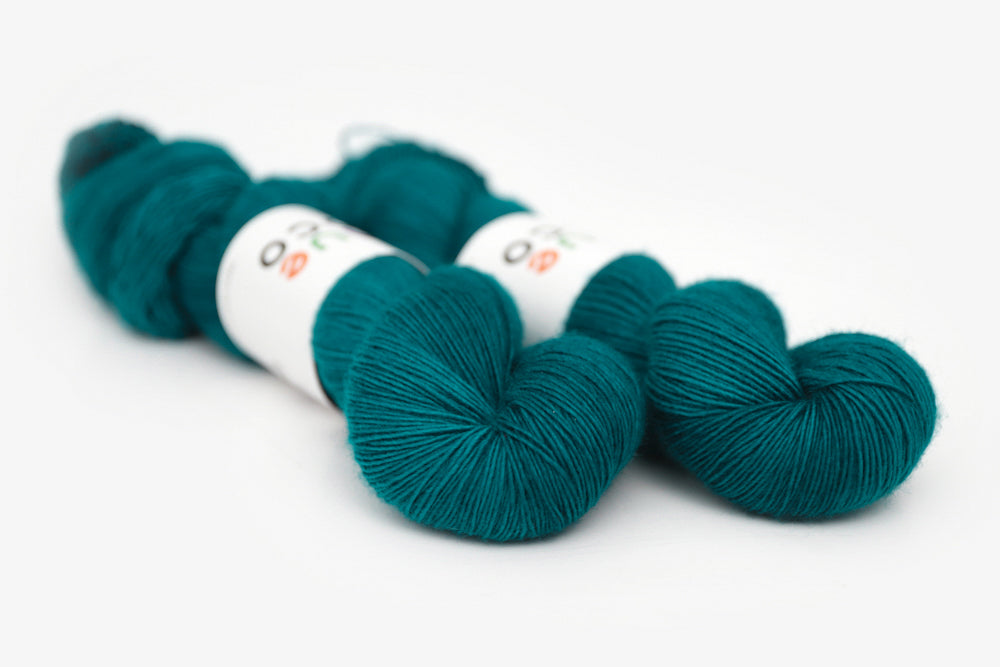 semisolid hand dyed blue green teal single sock yarn