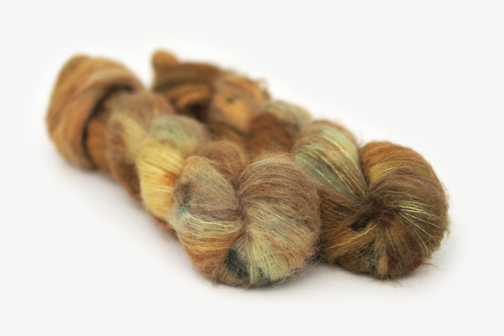 speckled hand dyed brown burnt orange olive alpaca suri lace yarn