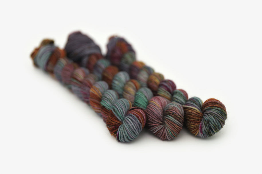 speckled hand dyed dark maroon gray teal orange phyllis sock mini yarn