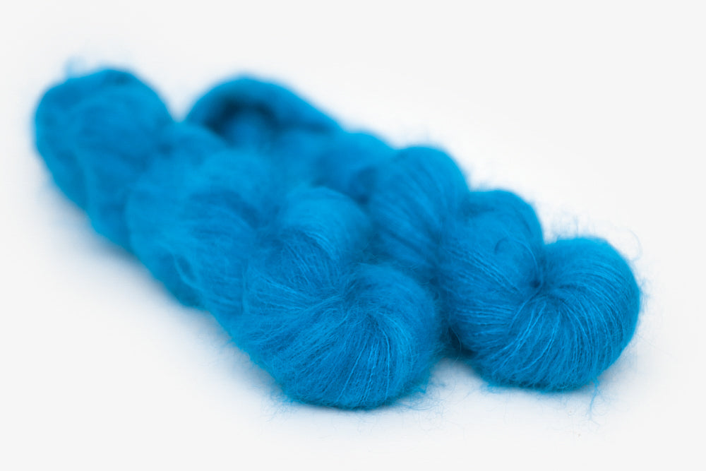 semisolid hand dyed cerulean (bright aqua blue) mohair lace yarn