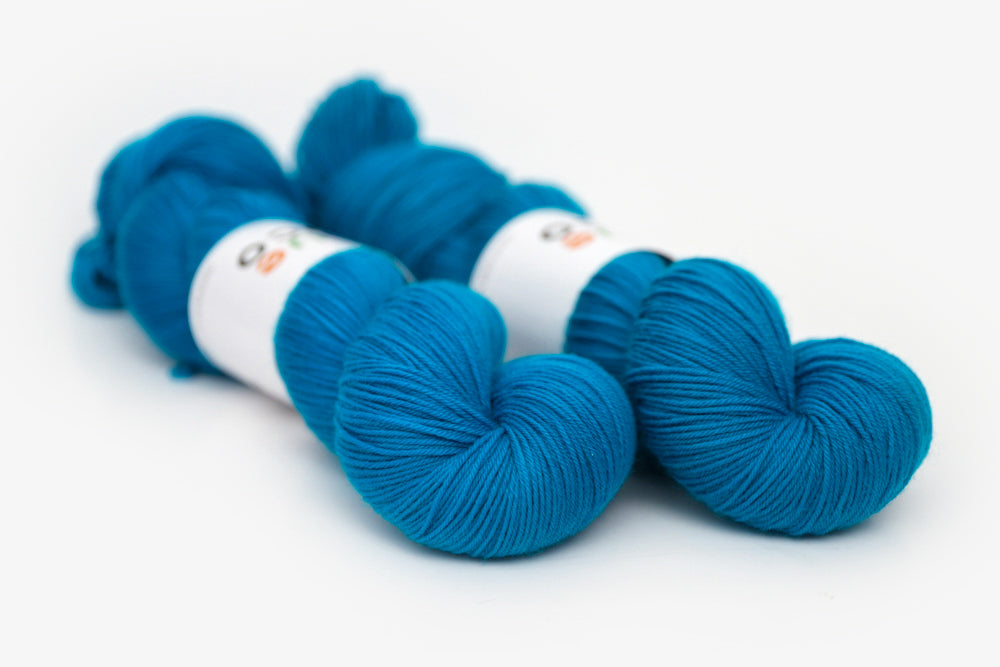 semisolid hand dyed cerulean (bright aqua blue) phyllis sock yarn
