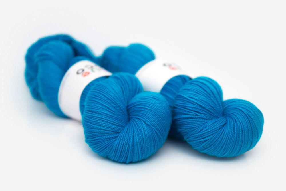 semisolid hand dyed cerulean (bright aqua blue) spun xl yarn