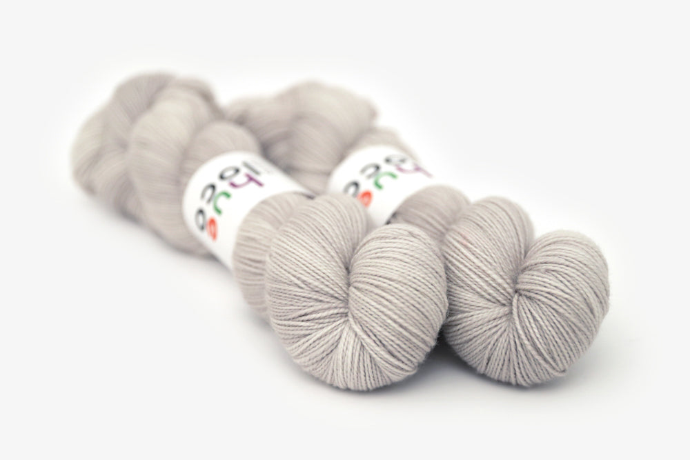semisolid hand dyed dove (light greige gray) merino sock yarn
