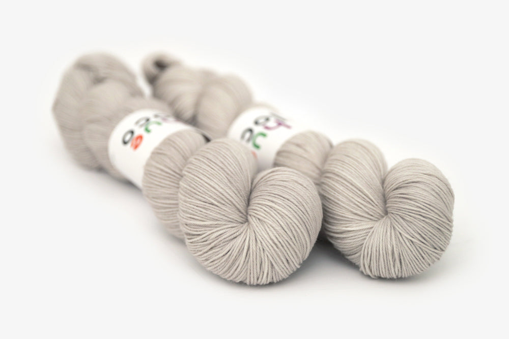 semisolid hand dyed dove (light greige gray) phyllis sock yarn