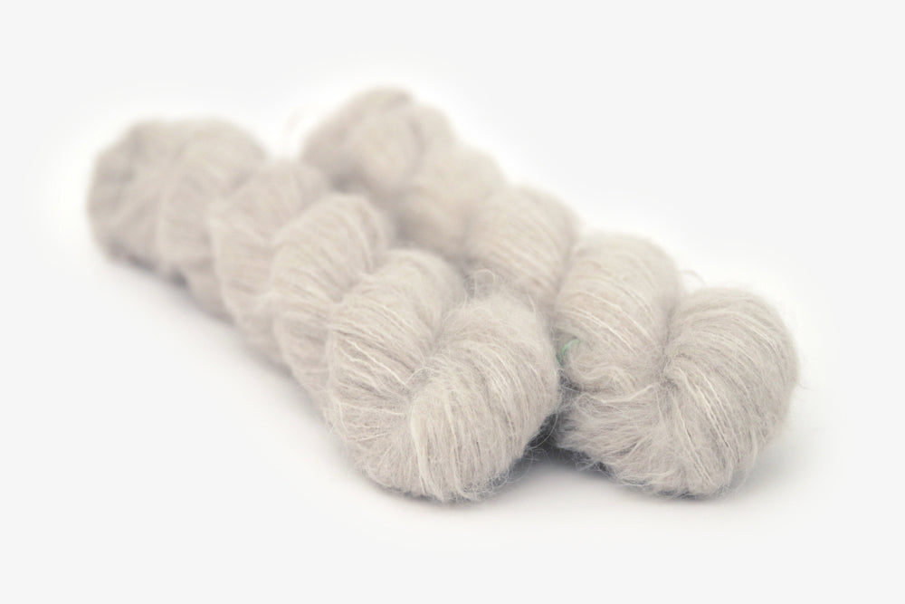 semisolid hand dyed dove (light greige gray) alpaca suri lace yarn