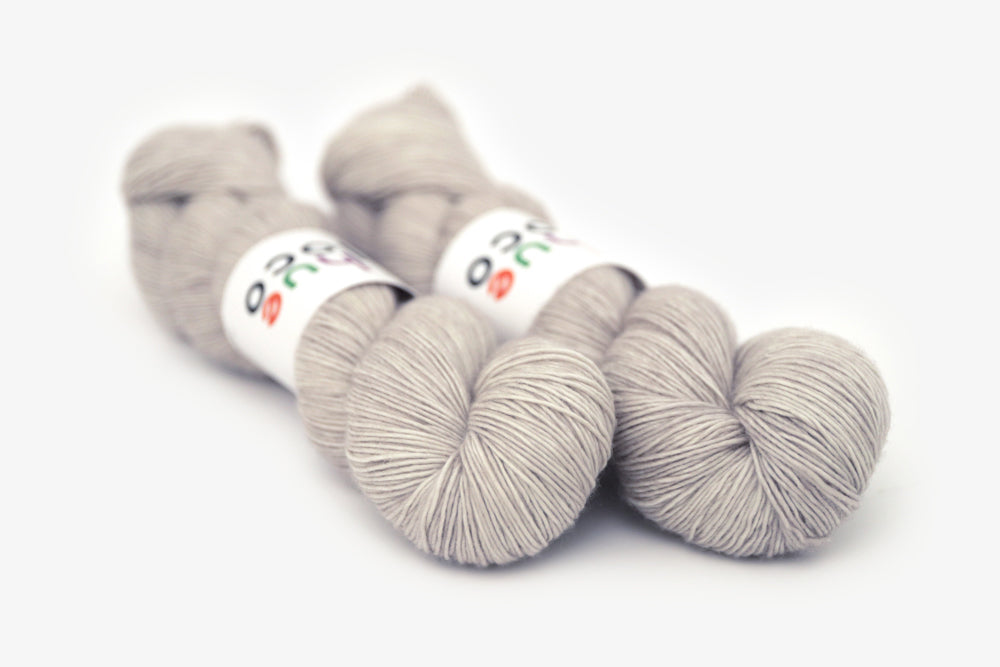 semisolid hand dyed dove (light greige gray) single sock yarn