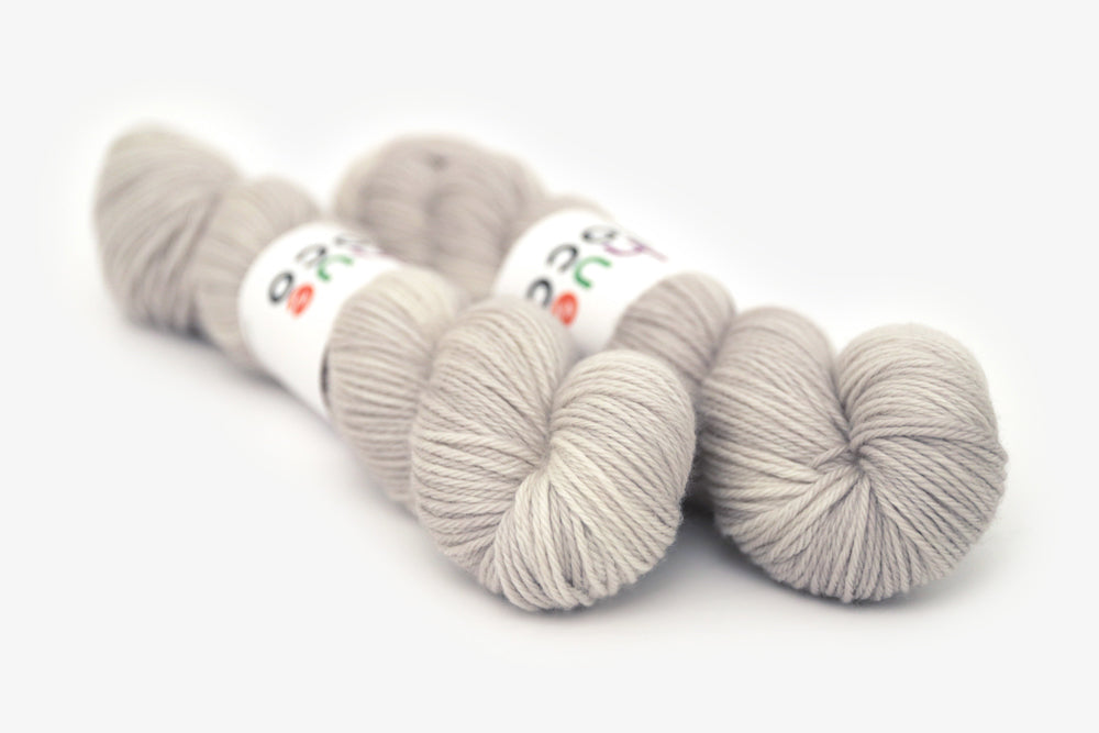 semisolid hand dyed dove (light greige gray) worsted yarn