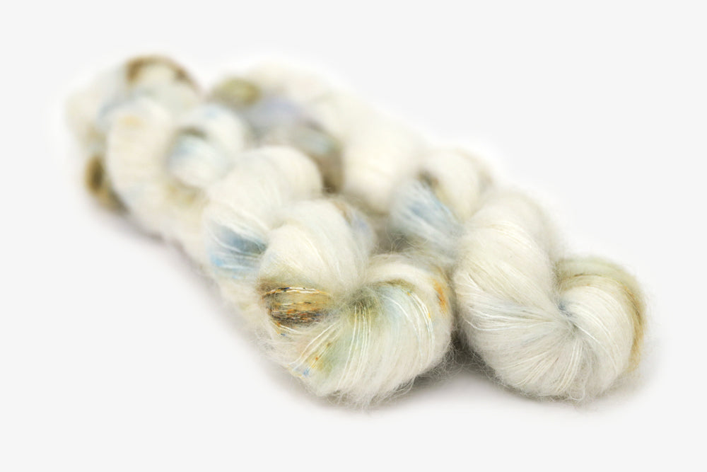 speckled hand dyed white olive yellow blue mohair lace yarn