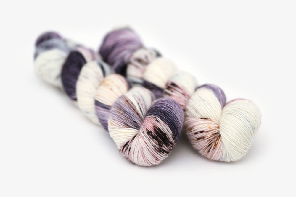 speckled hand dyed dark purple lilac white single sock yarn