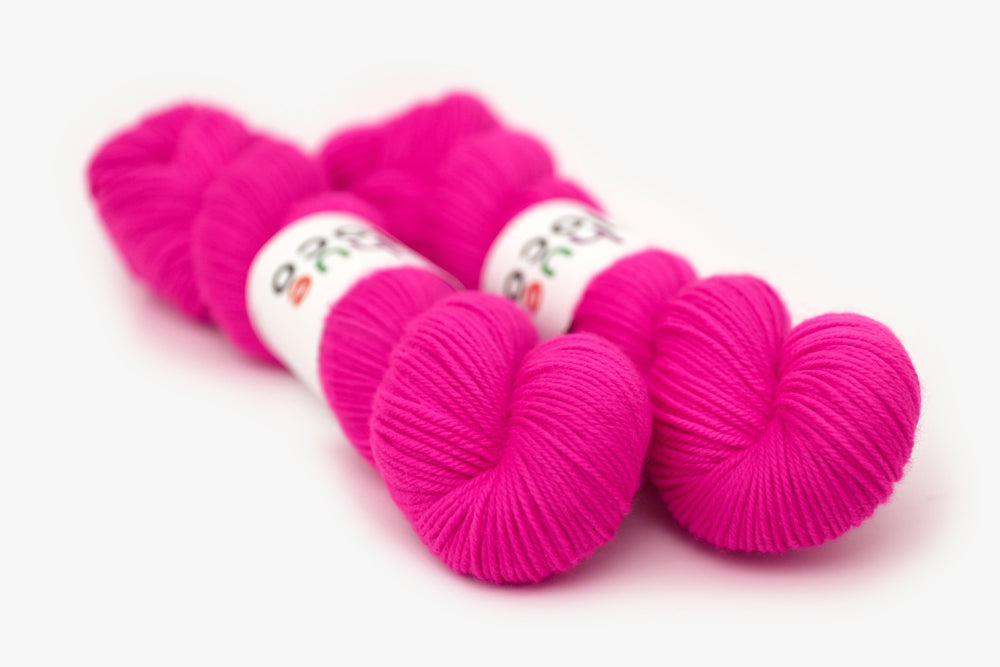 semisolid hand dyed fuchsia (bright hot pink) dk yarn