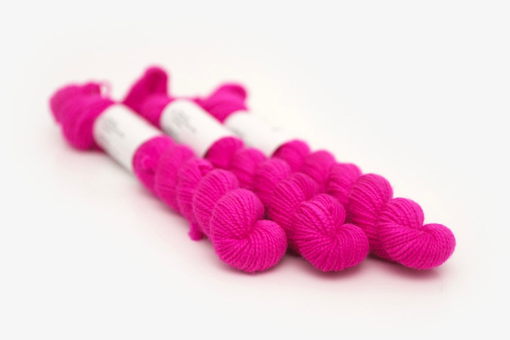 semisolid hand dyed fuchsia (bright hot pink) merino sock mini yarn