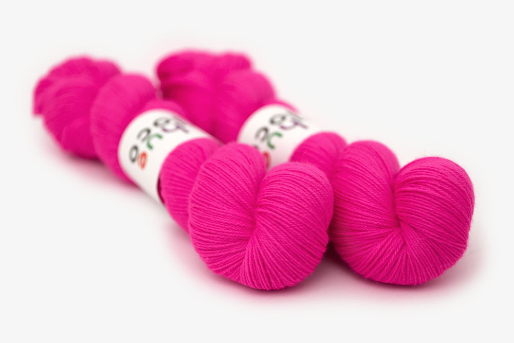semisolid hand dyed fuchsia (bright hot pink) phyllis sock yarn