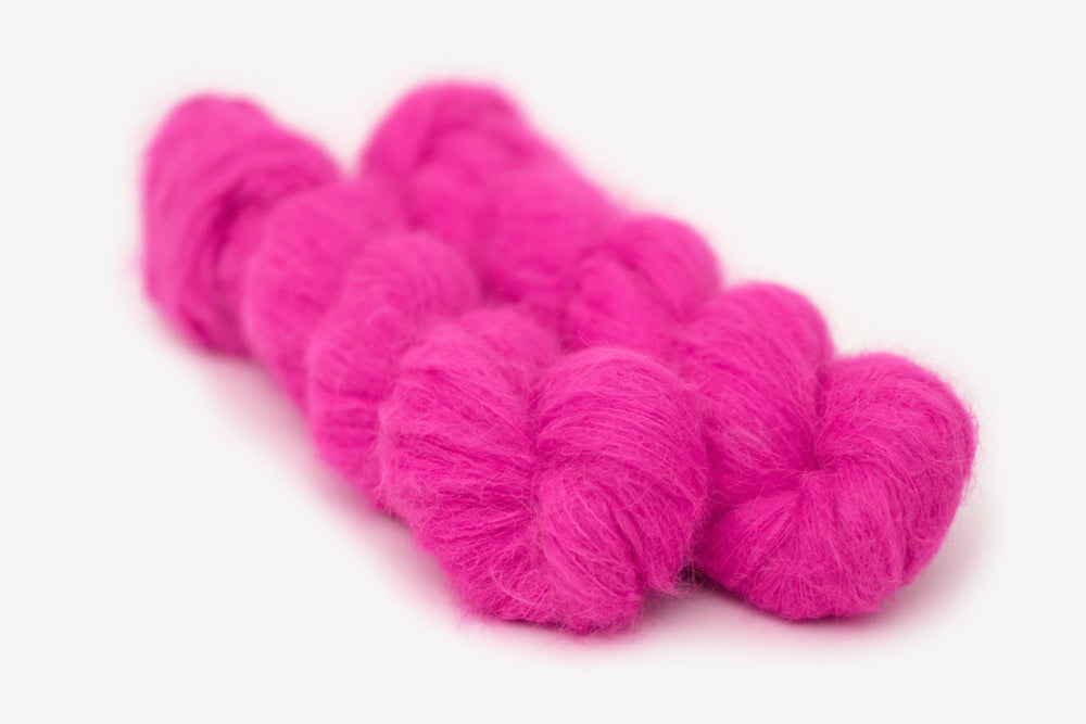 semisolid hand dyed fuchsia (bright hot pink) alpaca suri lace yarn