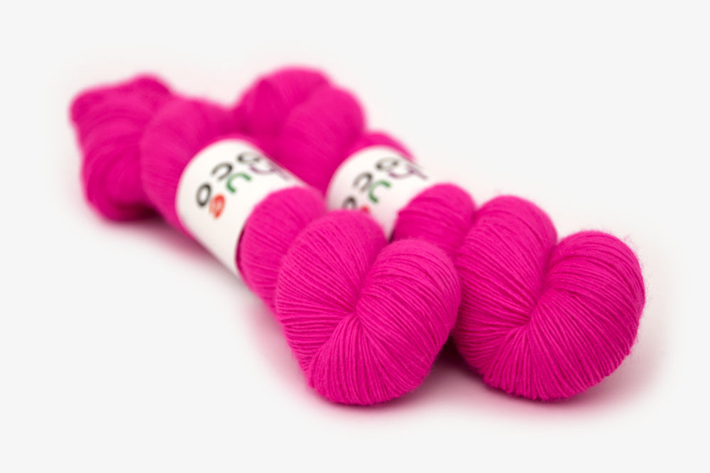 semisolid hand dyed fuchsia (bright hot pink) single sock yarn