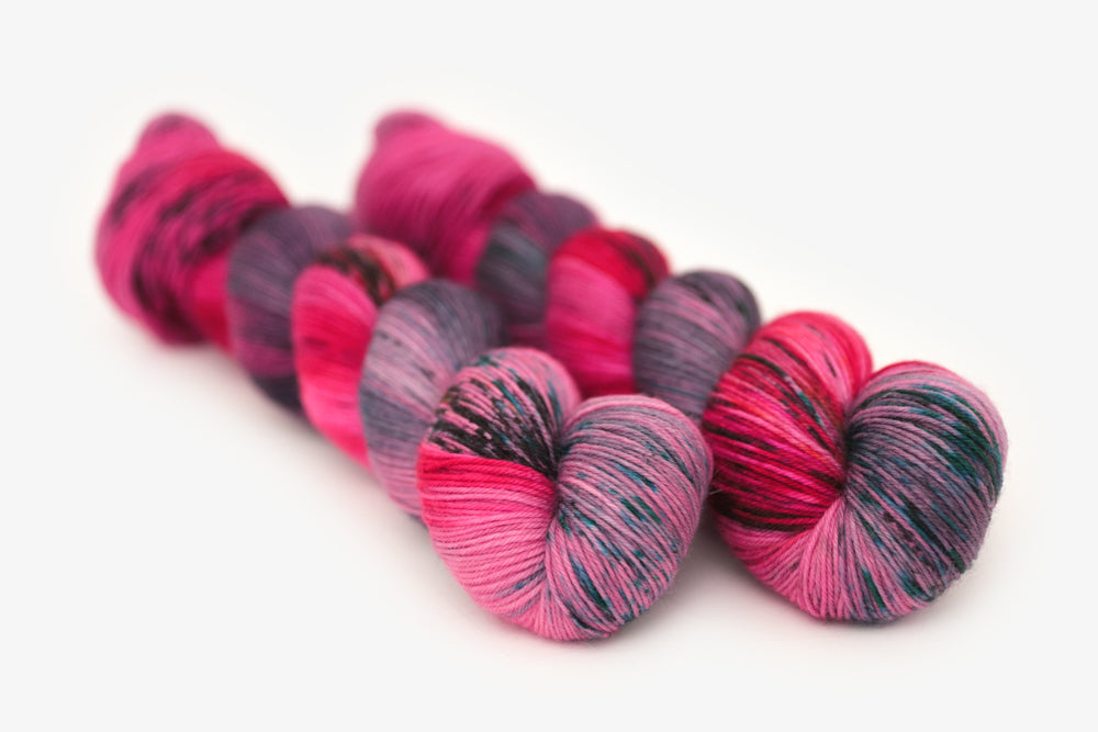 speckled hand dyed hot pink purple aqua phyllis sock yarn