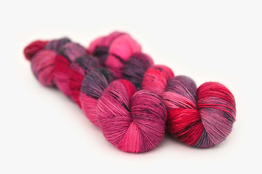 speckled hand dyed hot pink purple aqua single sock yarn