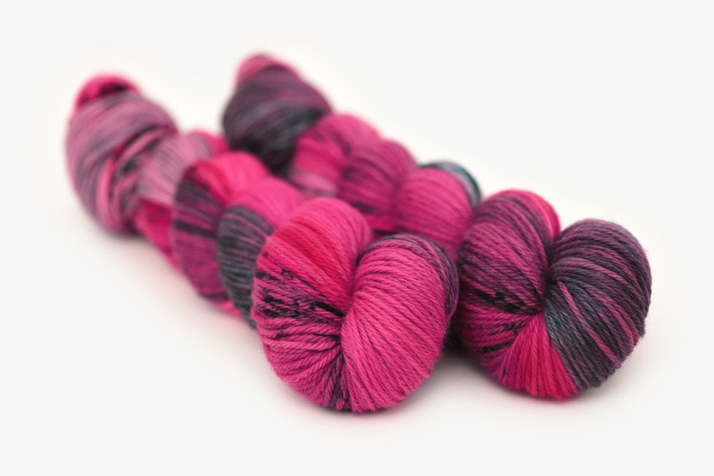 speckled hand dyed hot pink purple aqua worsted yarn