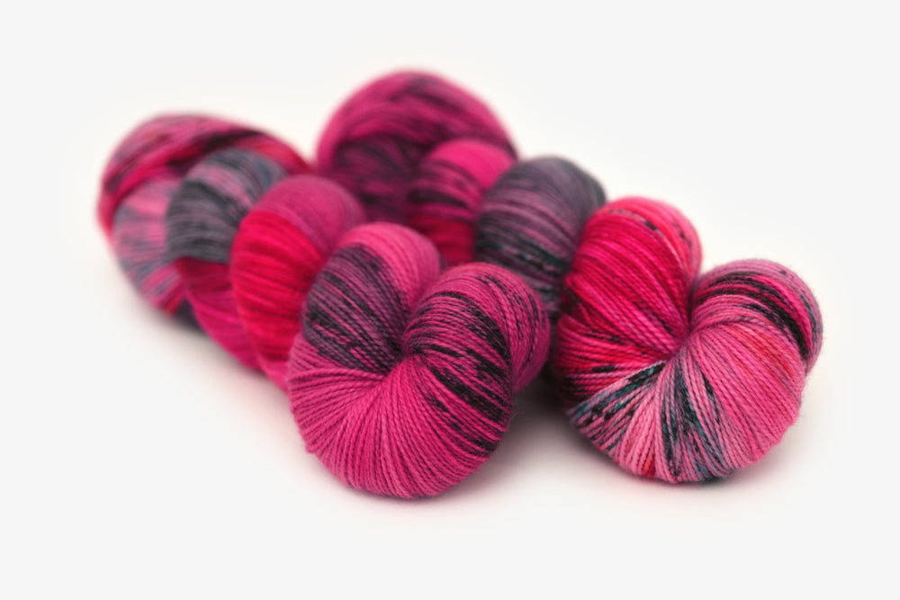speckled hand dyed hot pink purple aqua spun xl yarn