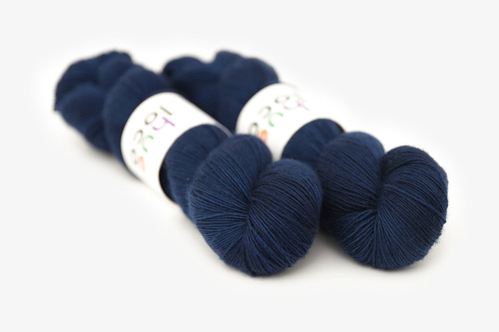 semisolid hand dyed lapis (dark indigo blue) single sock yarn