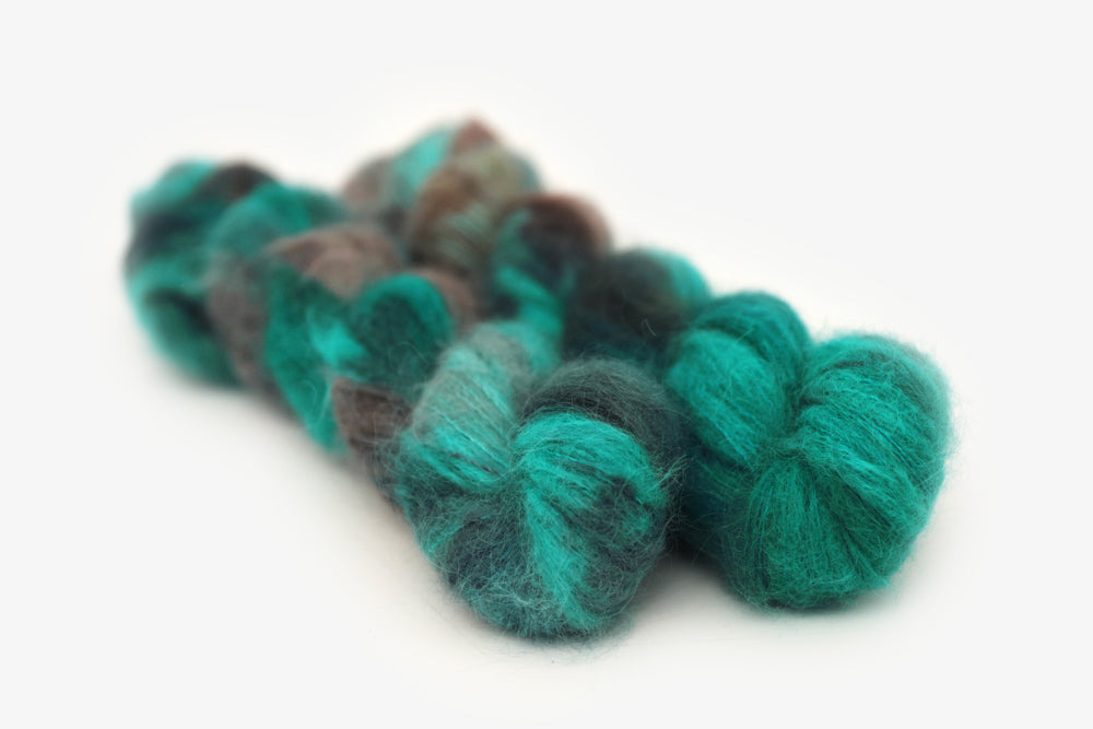 speckled hand dyed teal aqua dark purple alpaca suri lace yarn