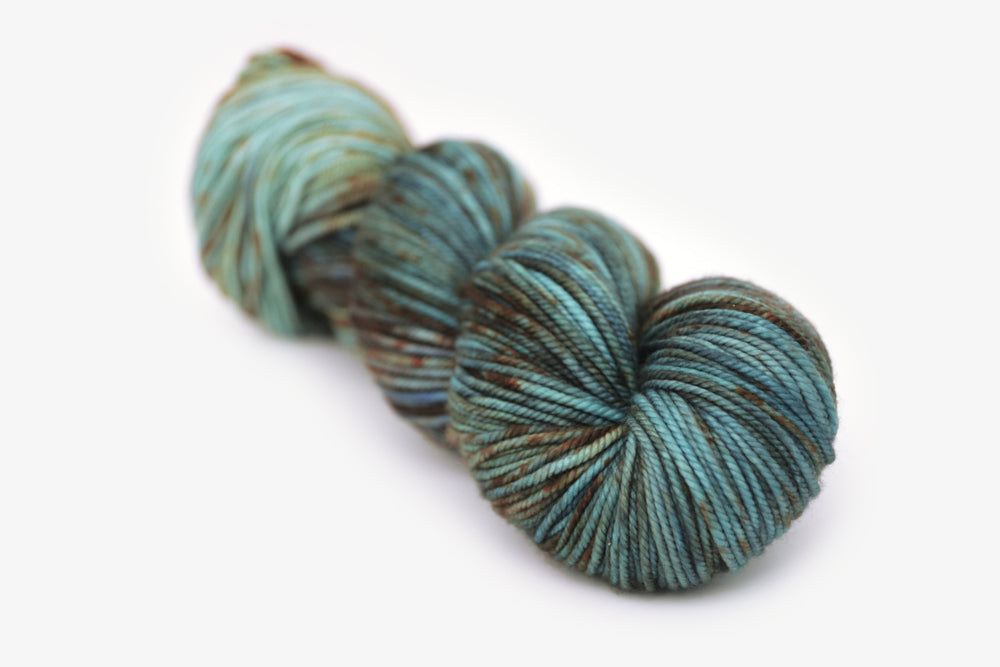 speckled hand dyed blue rust orange sage bulky yarn
