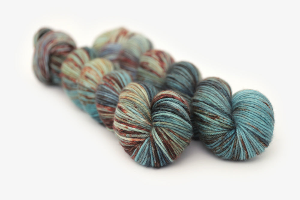 speckled hand dyed blue rust orange sage dk yarn