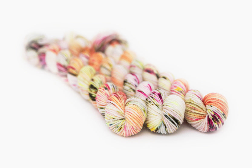 speckled hand dyed pink white neon yellow orange phyllis sock mini yarn