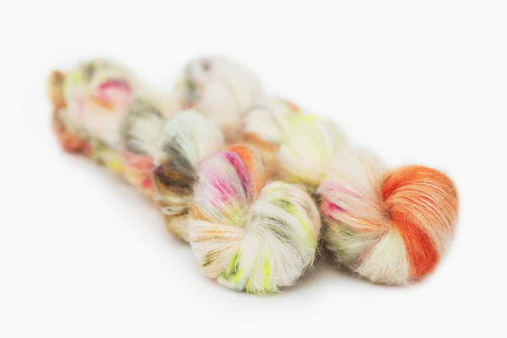 speckled hand dyed pink white neon yellow orange alpaca suri lace yarn