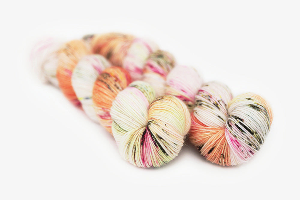 speckled hand dyed pink white neon yellow orange single sock yarn