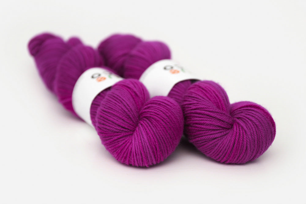 semisolid hand dyed mulberry (magenta berry pink) dk yarn 
