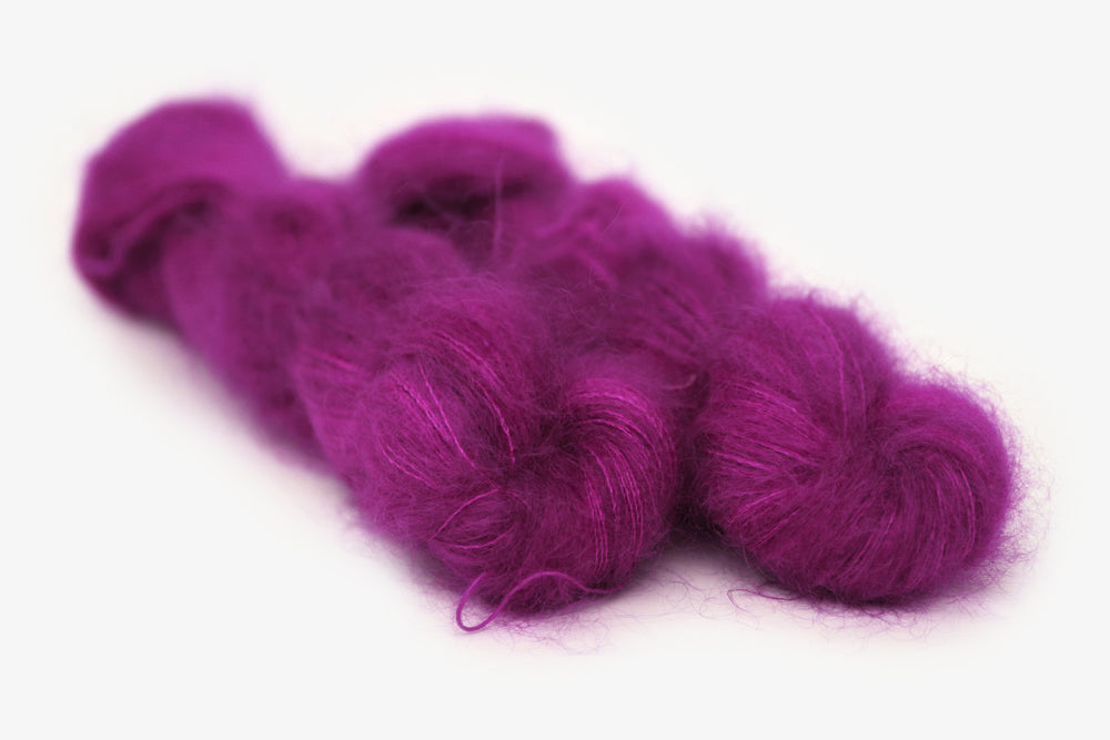 semisolid hand dyed mulberry (magenta berry pink) mohair lace yarn