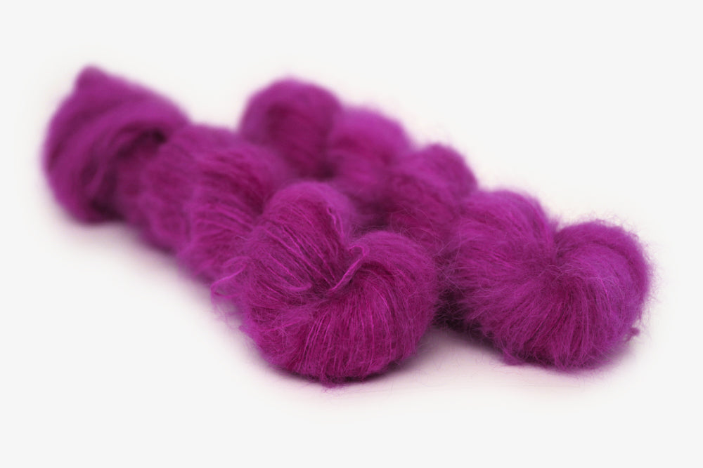semisolid hand dyed mulberry (magenta berry pink) alpaca suri lace yarn