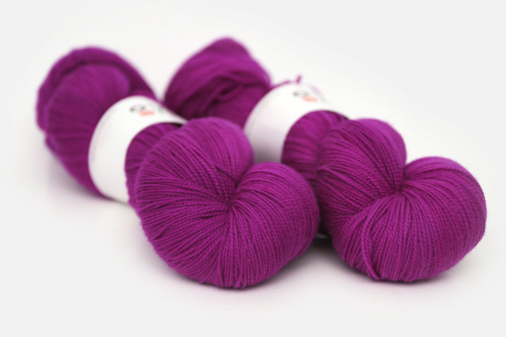 semisolid hand dyed mulberry (magenta berry pink) spun xl yarn 