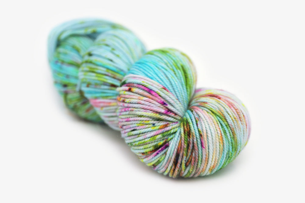 speckled hand dyed bright aqua green purple bulky yarn