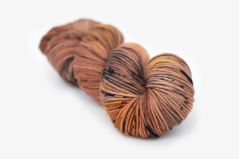 speckled hand dyed dusty pink yellow blue tan bulky yarn