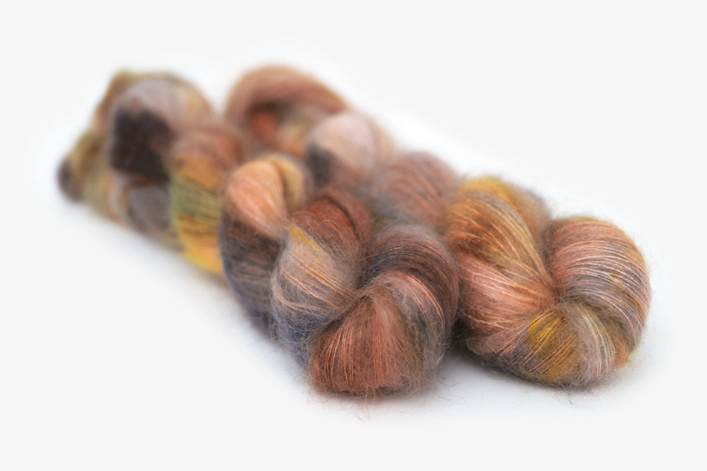 speckled hand dyed dusty pink yellow blue tan mohair lace yarn