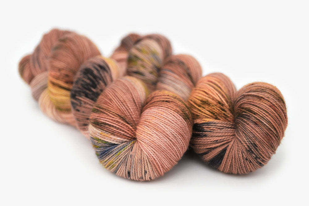 speckled hand dyed dusty pink yellow blue tan spun xl yarn