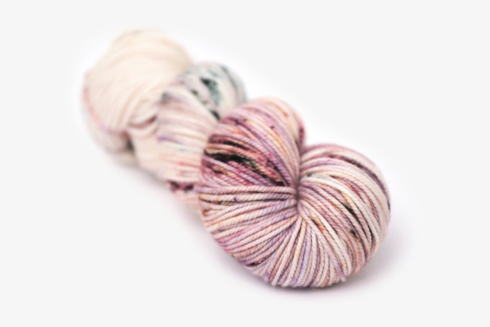 speckled hand dyed white pink mauve maroon bulky yarn