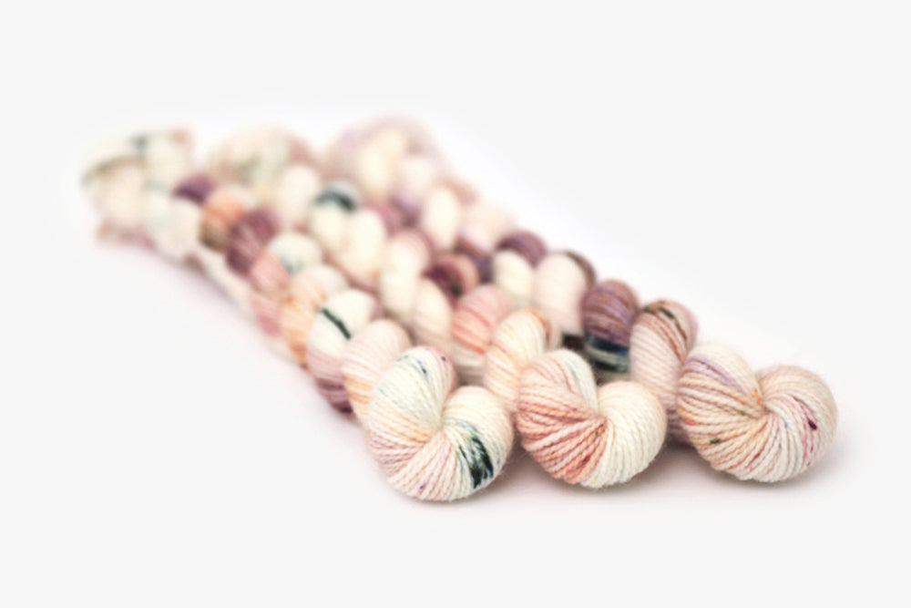 speckled hand dyed white pink mauve maroon merino sock mini yarn