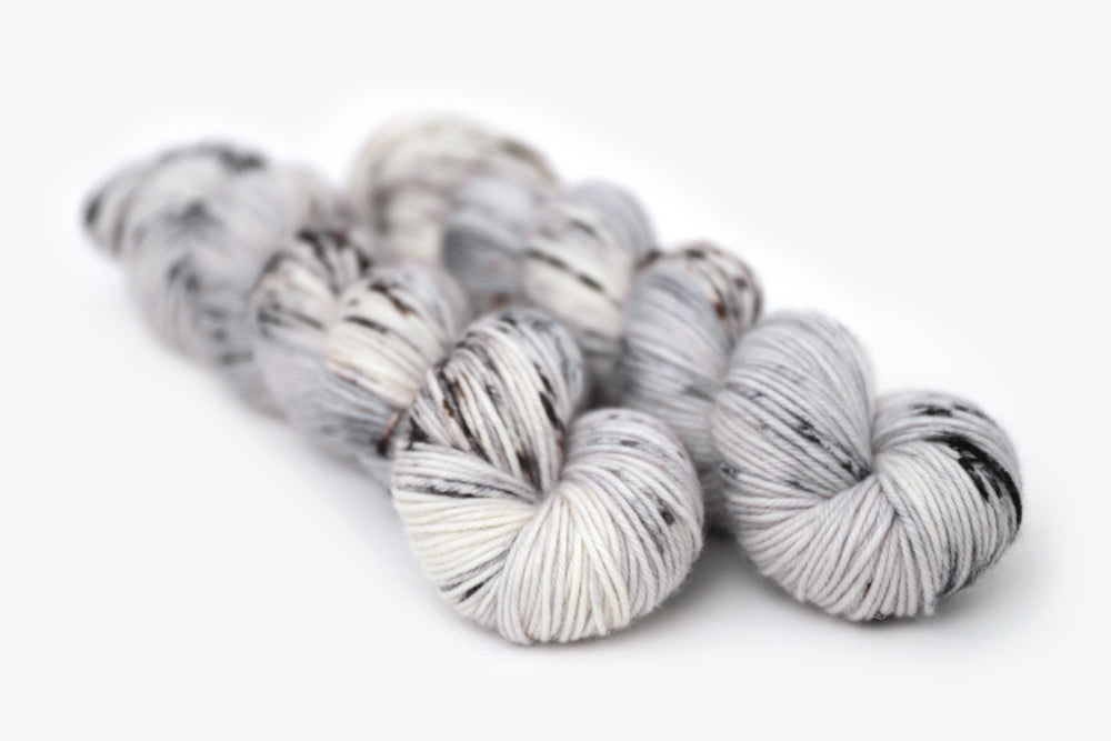 speckled hand dyed cool white gray brown dk yarn