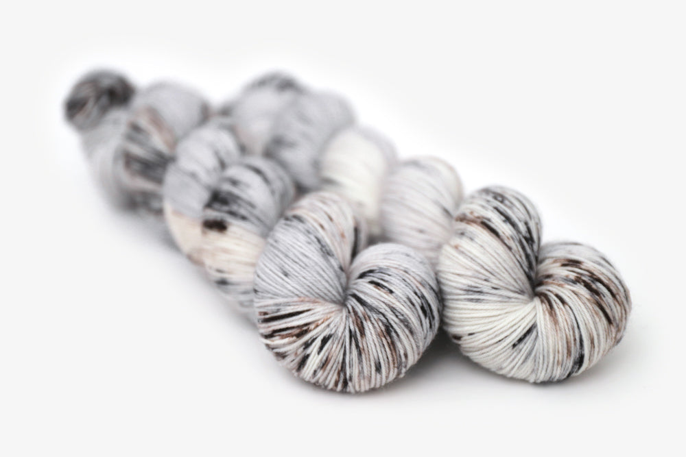speckled hand dyed cool white gray brown phyllis sock yarn