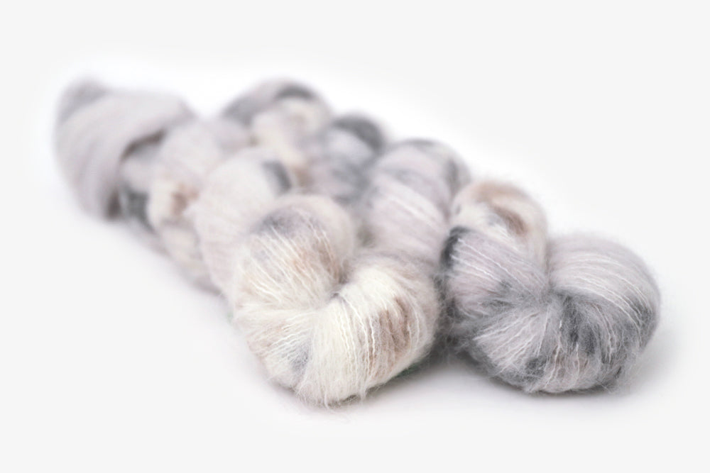 speckled hand dyed cool white gray brown alpaca suri lace yarn