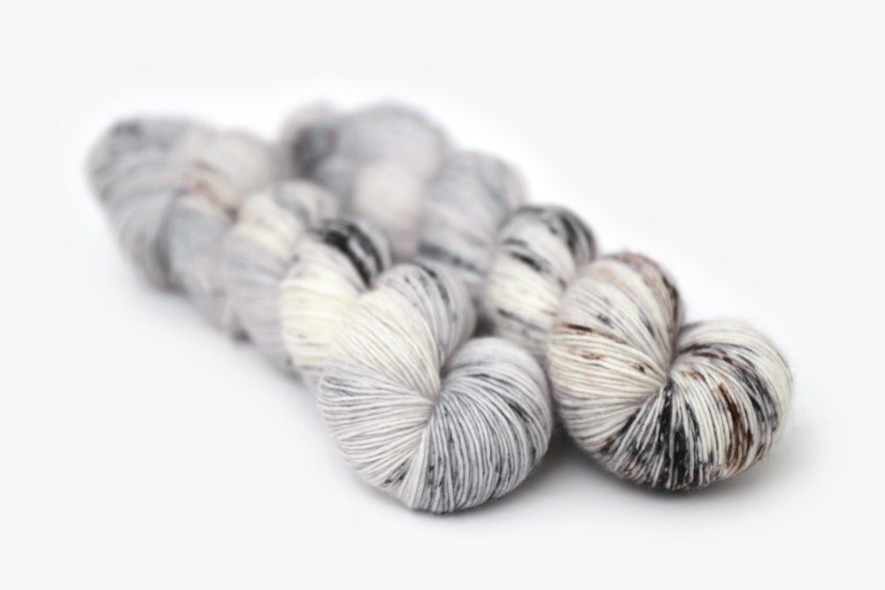 speckled hand dyed cool white gray brown single sock yarn
