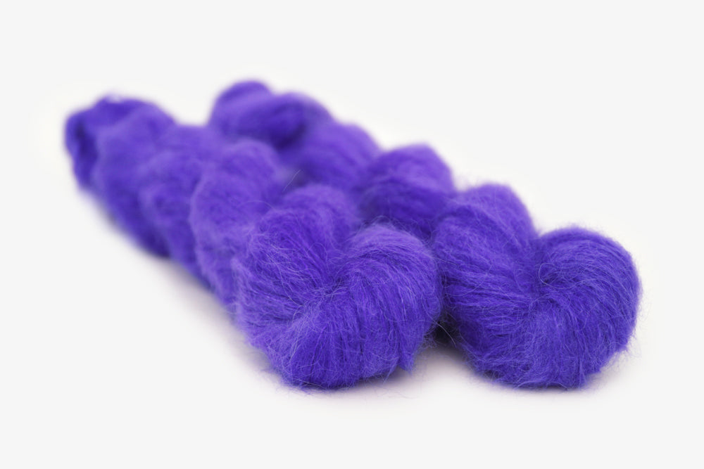 semisolid hand dyed ultraviolet (bright purple blue) alpaca suri lace yarn