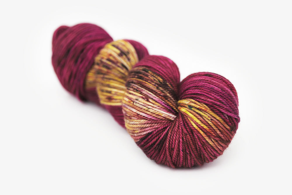 speckled hand dyed magenta gold olive bulky yarn