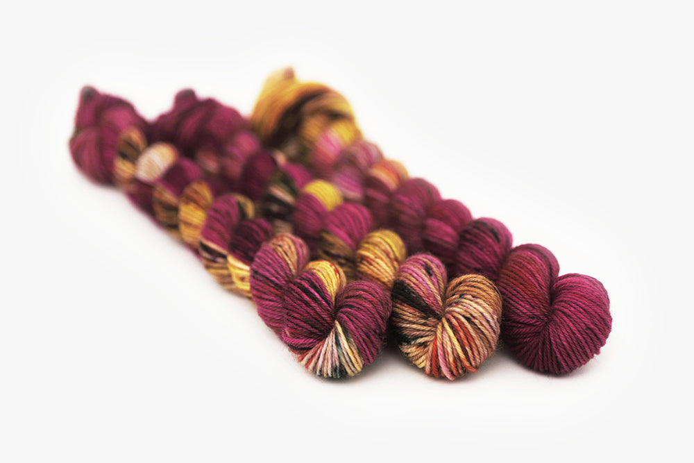 speckled hand dyed magenta gold olive phyllis sock mini yarn