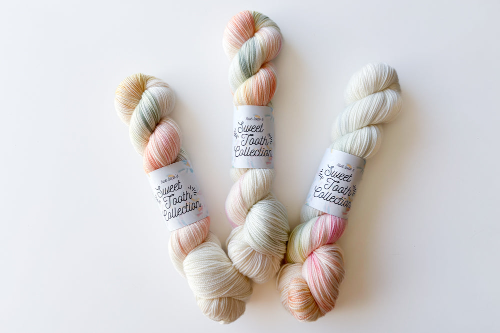 tonal hand dyed pale pink white beige blue yarn