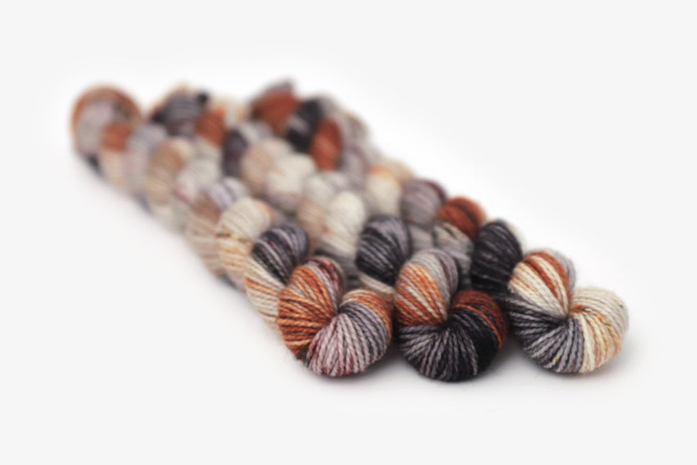 speckled hand dyed green orange purple gray merino sock mini yarn